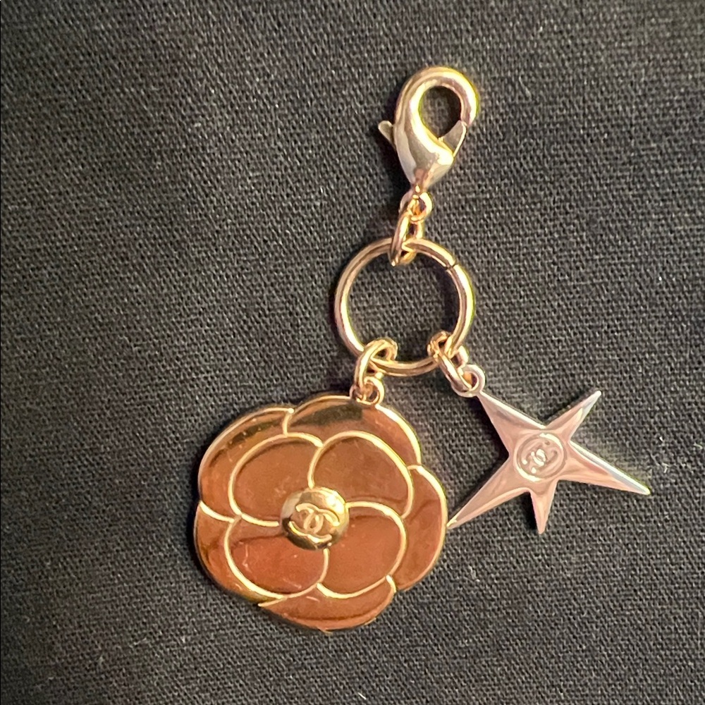 CHANEL Gold Flower and Silver Star Charm